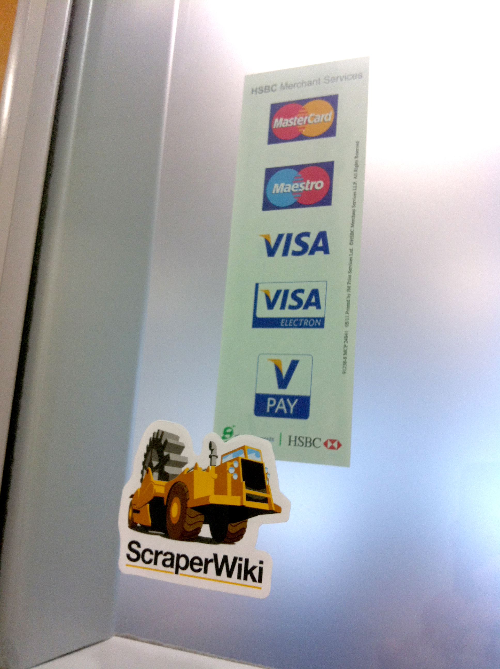 ScraperWiki digger in front of credit card payment logos